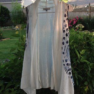 Variations  Sleeveless waterfall open front. Sm.